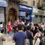 Crowds pack the sidewalk for Coddiwomple's grand opening/Upper East Site