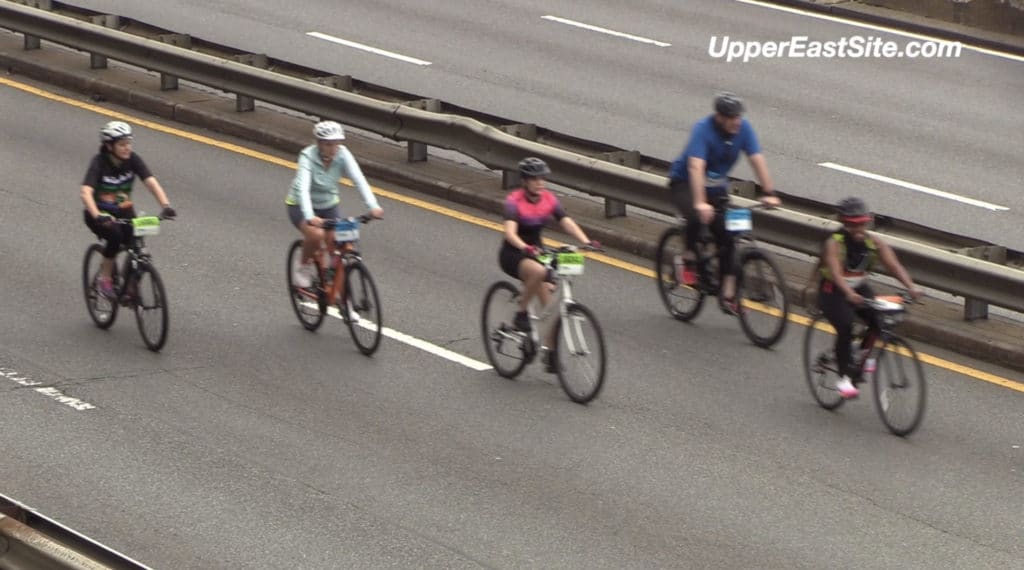 Cyclists enjoy wide open lanes on the FDR Drive during the Five Boro Bike Tour/Upper East Site