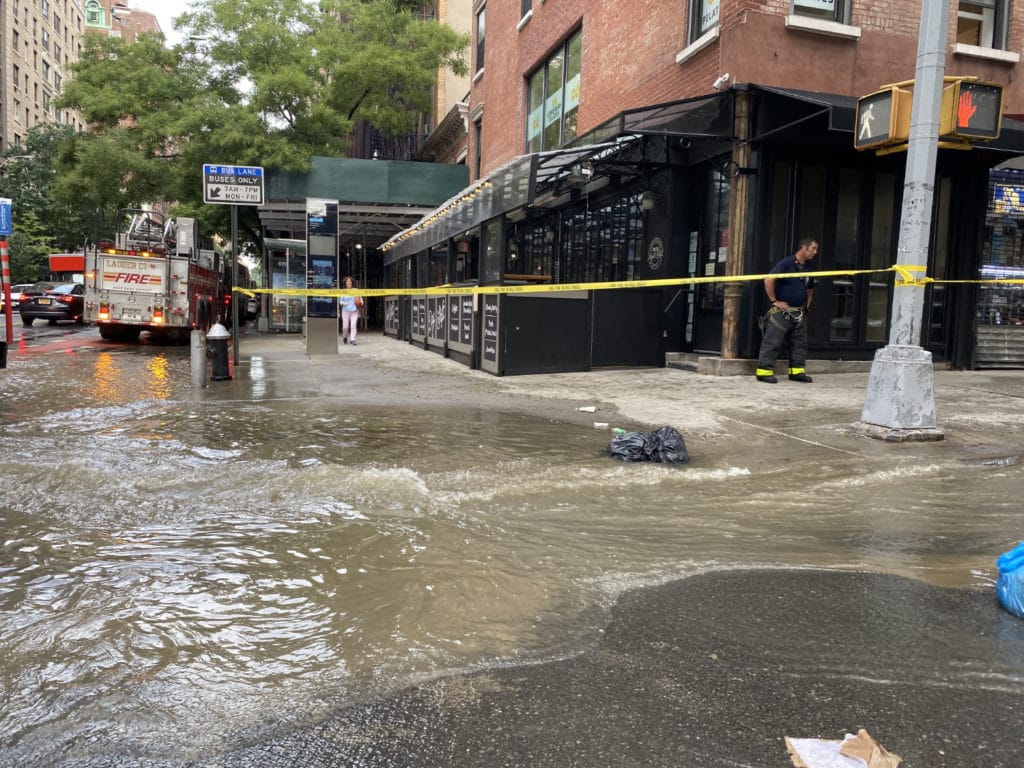Flooding at the corner of East 79th Street and Third Avenue