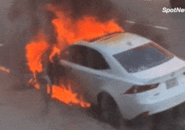 Car goes up in flames after motorcycle explosion/SpotNews.tv for Upper East Site