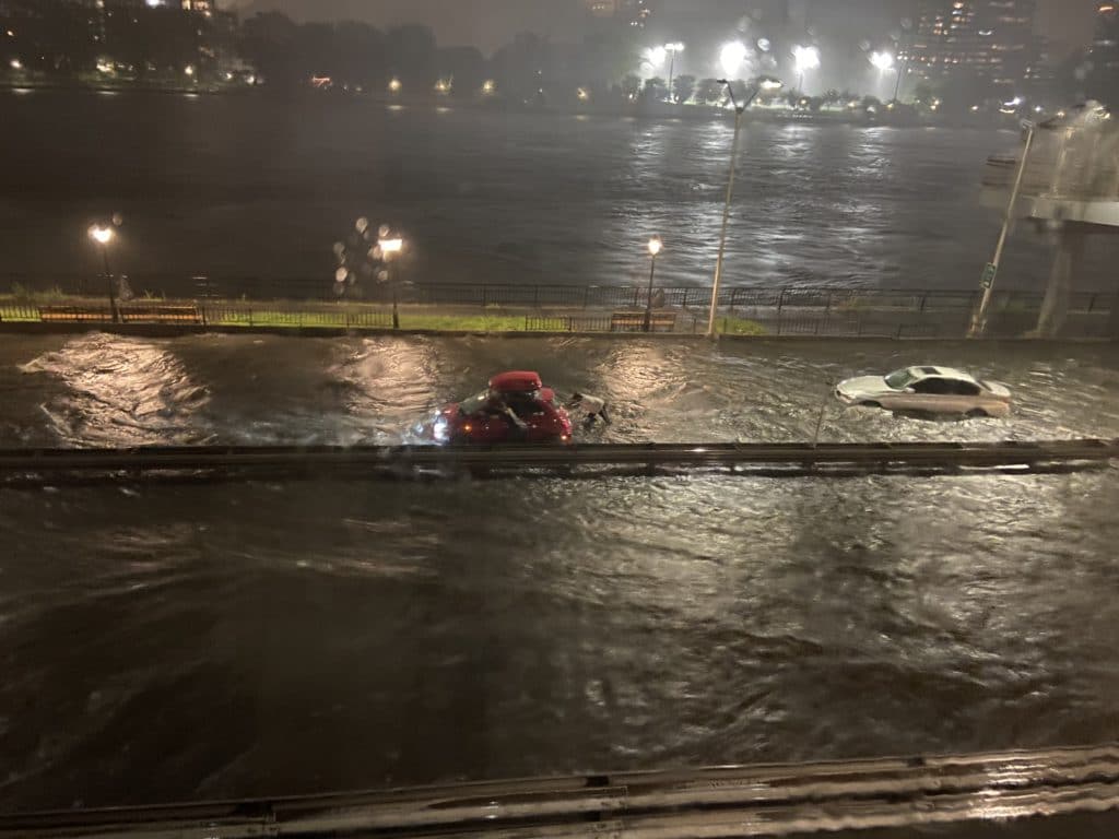 Driver pushes car through flooded FDR Drive during Hurricane Ida | SpotNewsGetPaid.com for Upper East Site
