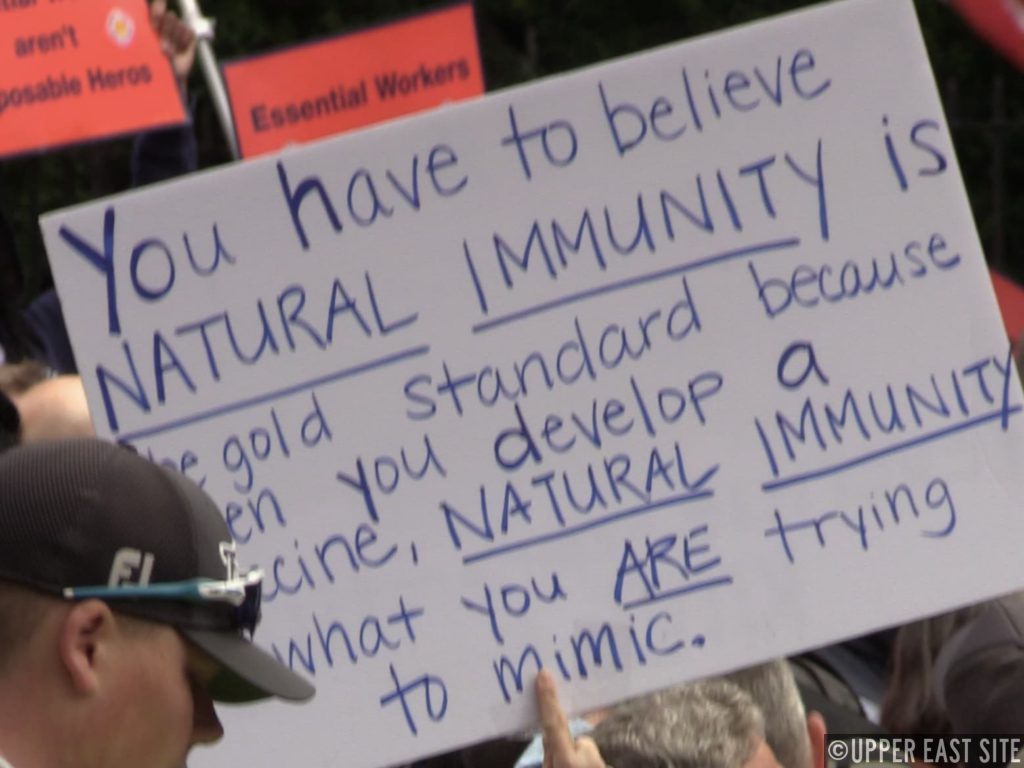 Sign falsely stating natural immunity is more protective than vaccination/Upper East Site