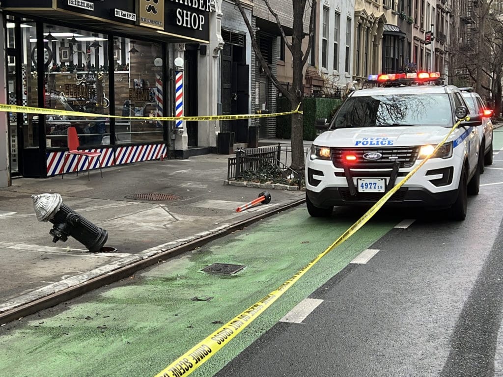 Broken fire hydrant apparently struck before cyclists/Upper East Site