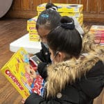 Kids in need receive gifts from UES Mutual Aid's holiday 'toy store'/Meryl Jacobs for Upper East Site