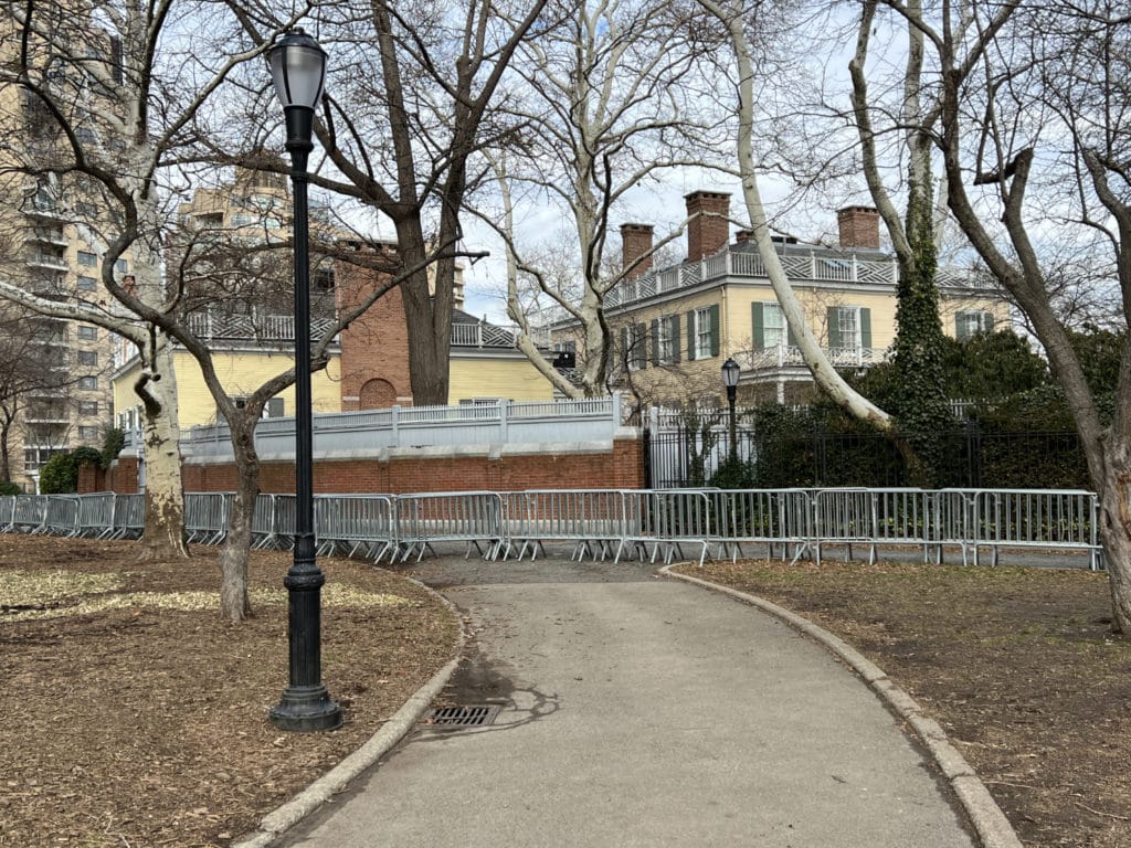 Barricades now stored along side Gracie Mansion fence/Upper East Site