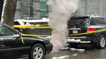 Smoky manhole on East 92nd Street likely caused by road salt and melting snow/Upper East Site