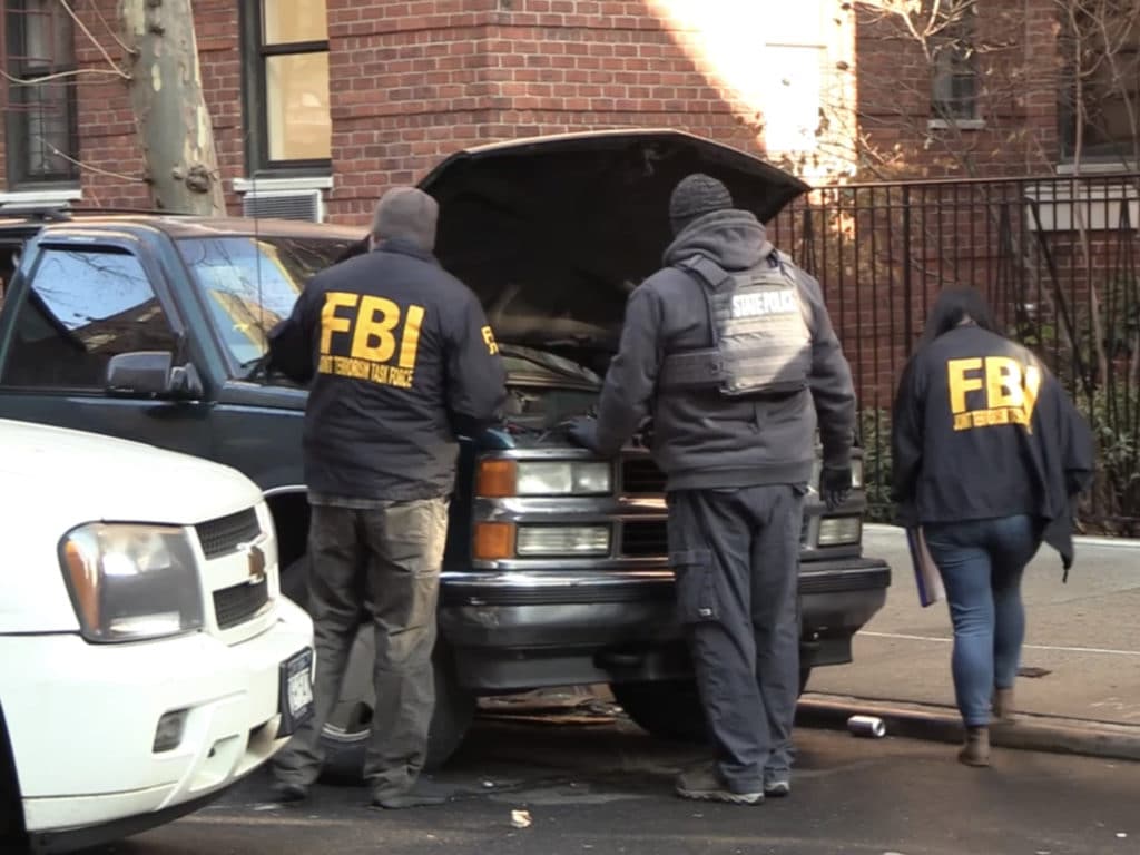 Joint Terrorism Task Force searchers Samuel Fisher's SUV in Yorkville on January 20, 2021/Upper East Site