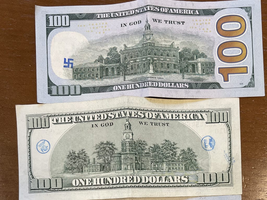 Hundred dollar bills dispensed from Chase ATM stamped with symbols of hate/Robyn Roth-Moise