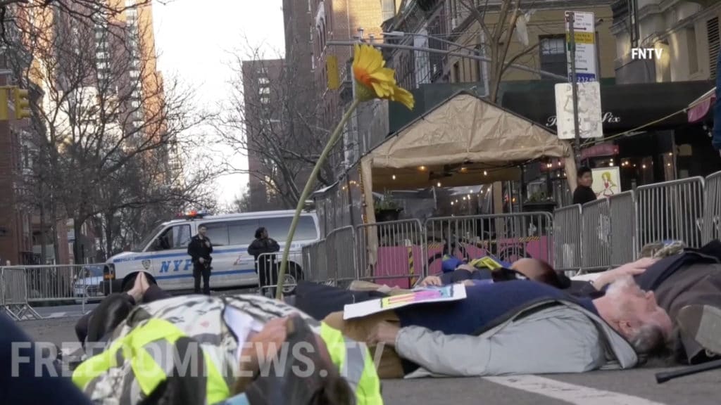 Protesters hold 'die-in' in front of Russian Consulate on the UES