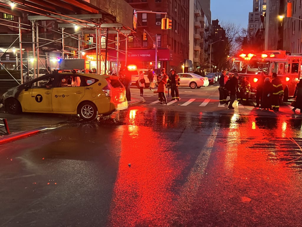 Elderly woman pulled from taxi fire on East 83rd Street by aide/Upper East Side
