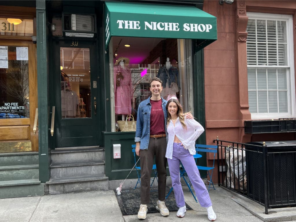 Nichole with Nick, her business partner and fiancé, outside The Niche Shop on opening day in 2022 | Upper East Site