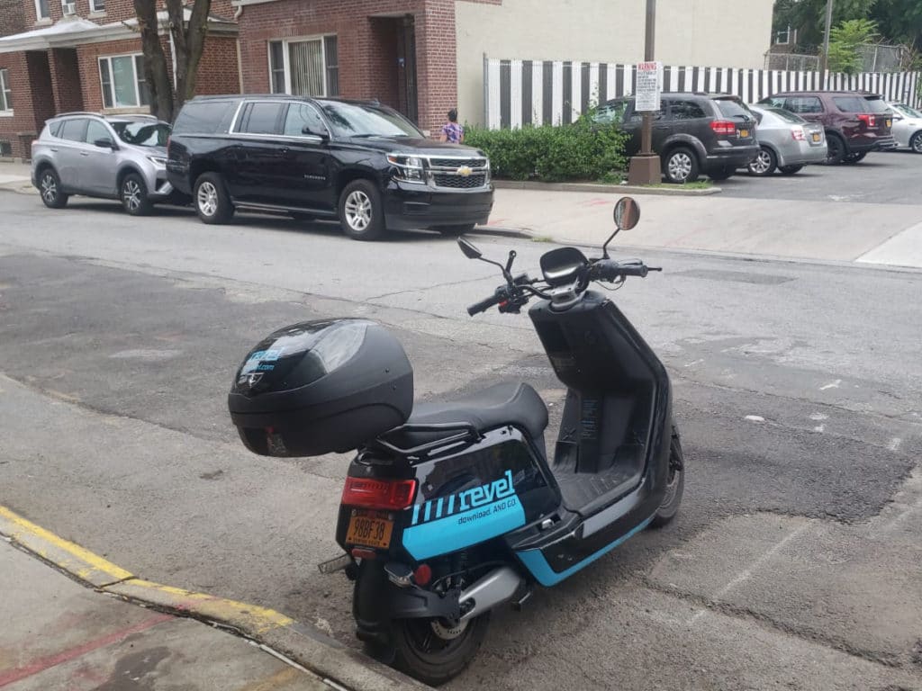 Revel moped parked on the street in Astoria, Queens