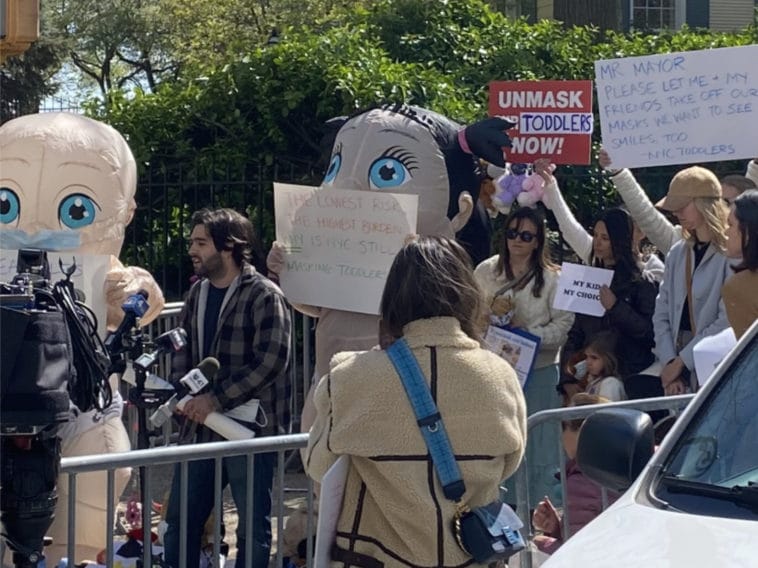 Anti-maskers in baby costumes protest outside Gracie Mansion