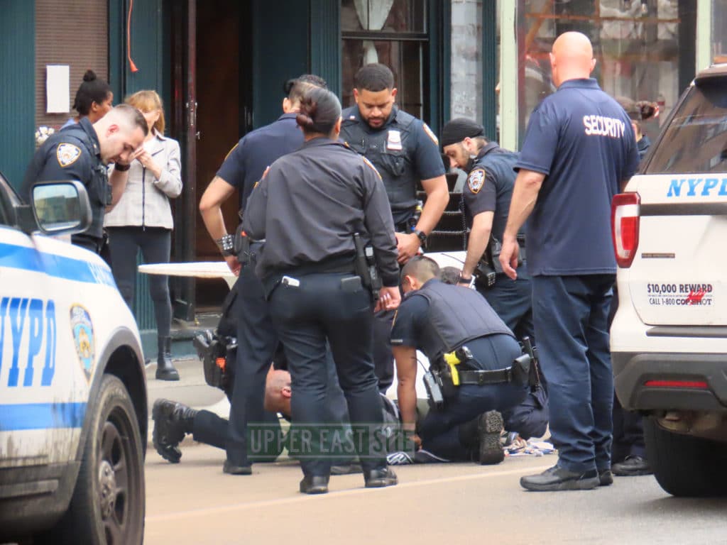 NYPD officers restrain attempted robbery suspect/Upper East Site