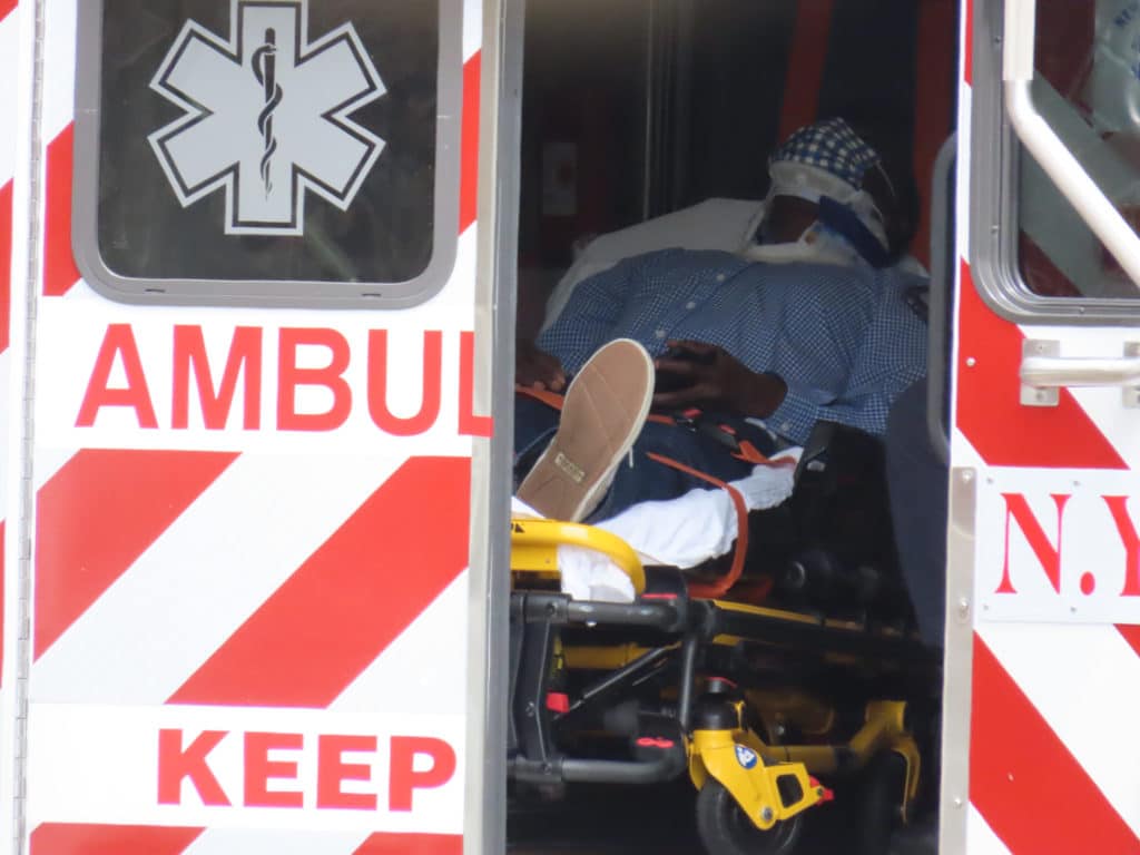 Injured man taken from crash scene by ambulance/Upper East Site