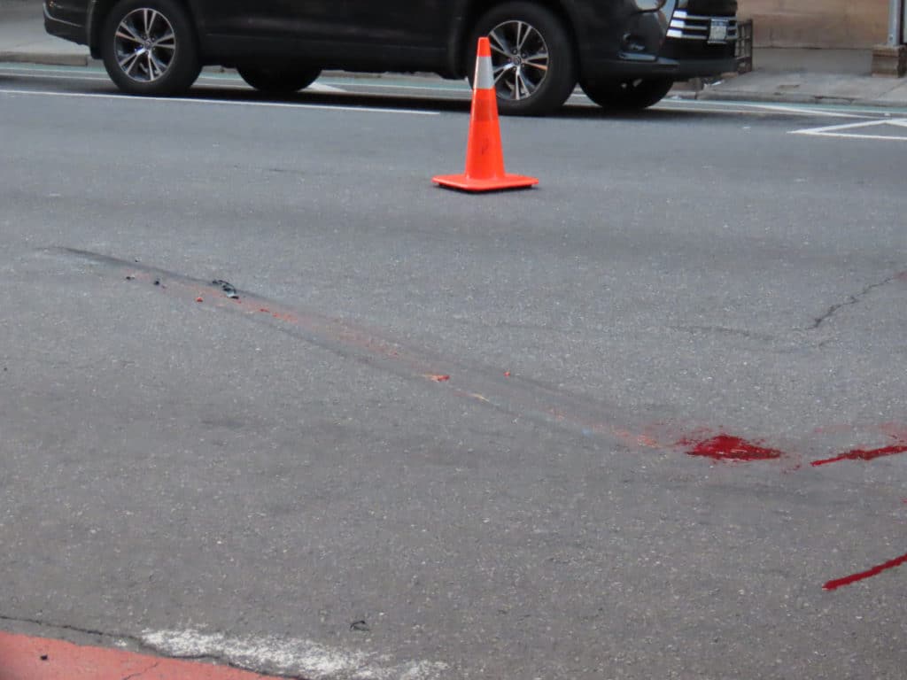 Skid mark where the victim was dragged by truck/Upper East Site