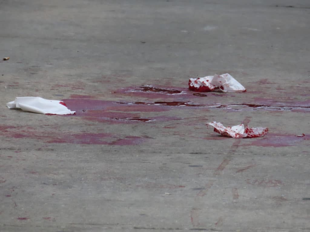 Blood stains the sidewalk on East 63rd Street after a man was stabbed | Upper East Site