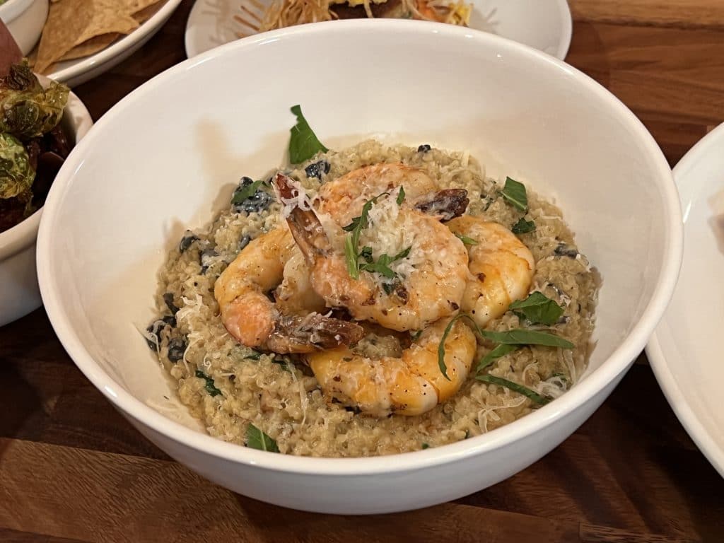 Camarones al Sarten features roasted shrimp, quinoa risotto, huitlacoche truffle crema and parmesan | Upper East Site