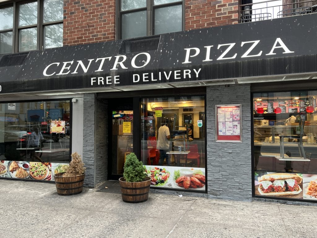 Centro Pizza's closure notice visible after covering was removed | Upper East Site