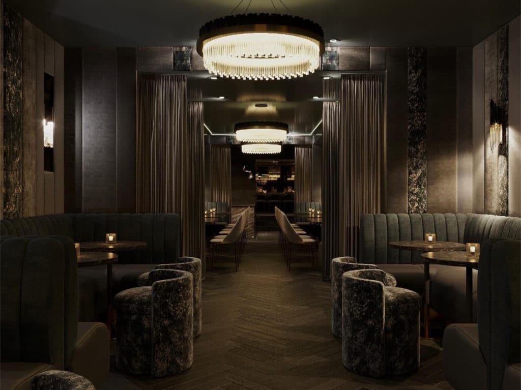 TBar's redesigned interior features velvet booths and chandeliers | Courtesy of TBar