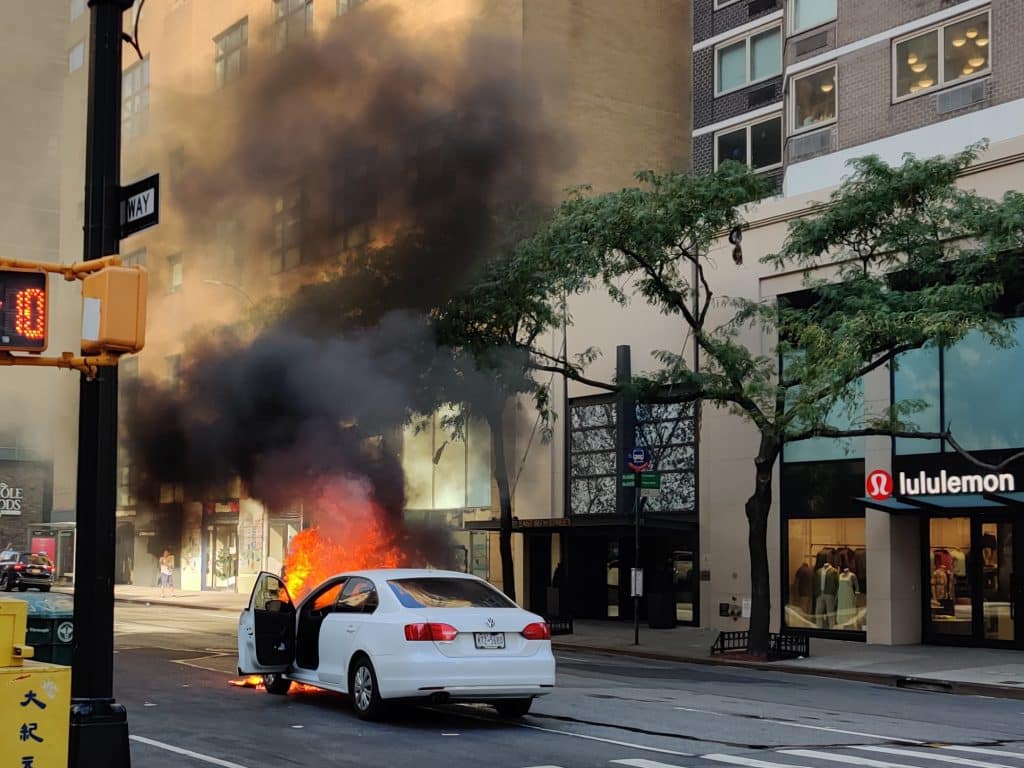 The Volkswagen Jetta's front end was engulfed in flames 