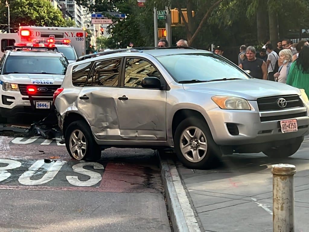 The RAV4 went up on the sidewalk after it was rammed by the Mercedes, witnesses say | Upper East Site