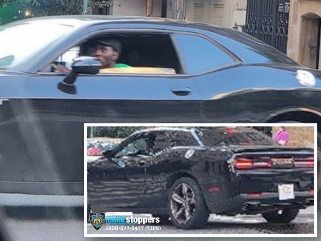 The suspected getaway driver is seen in black Dodge Challenger, according to police | NYPD