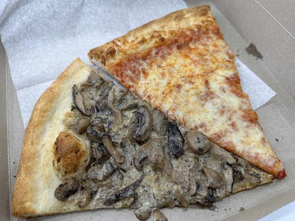 The plain slice and truffle mushroom slice at Giacomo's Pizza | Upper East Site