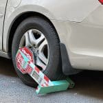 A Honda minivan remains booted on East 91st Street weeks after the device was installed | Upper East Site