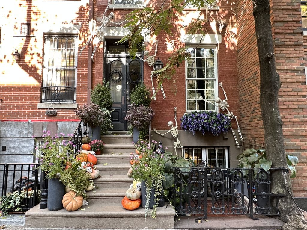Skeletons and pumpkins decorate the front of 259 East 78th Street | Upper East Site