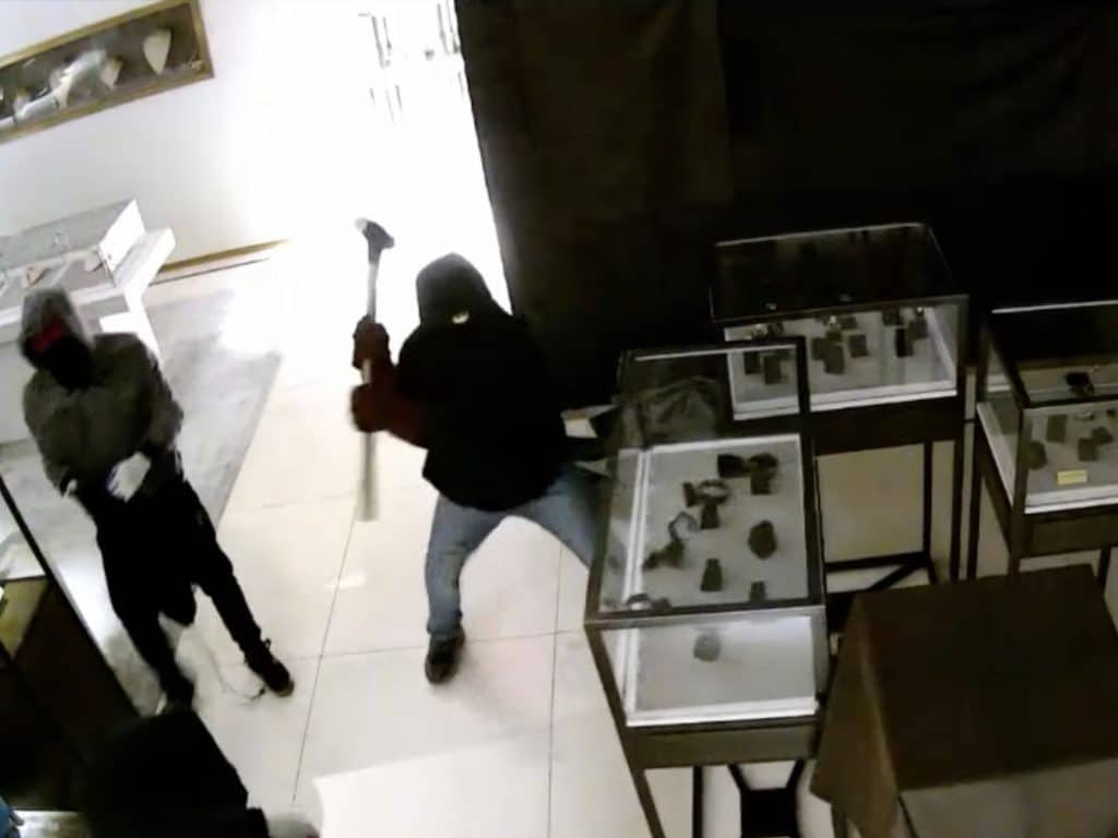The burglars used a sledgehammer to smash open display cases at Cellini Jewelers | NYPD