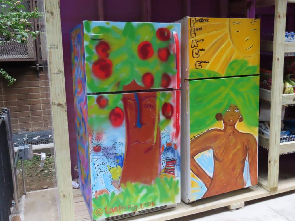 The two large refrigerators were painted by a Bronx-based artist