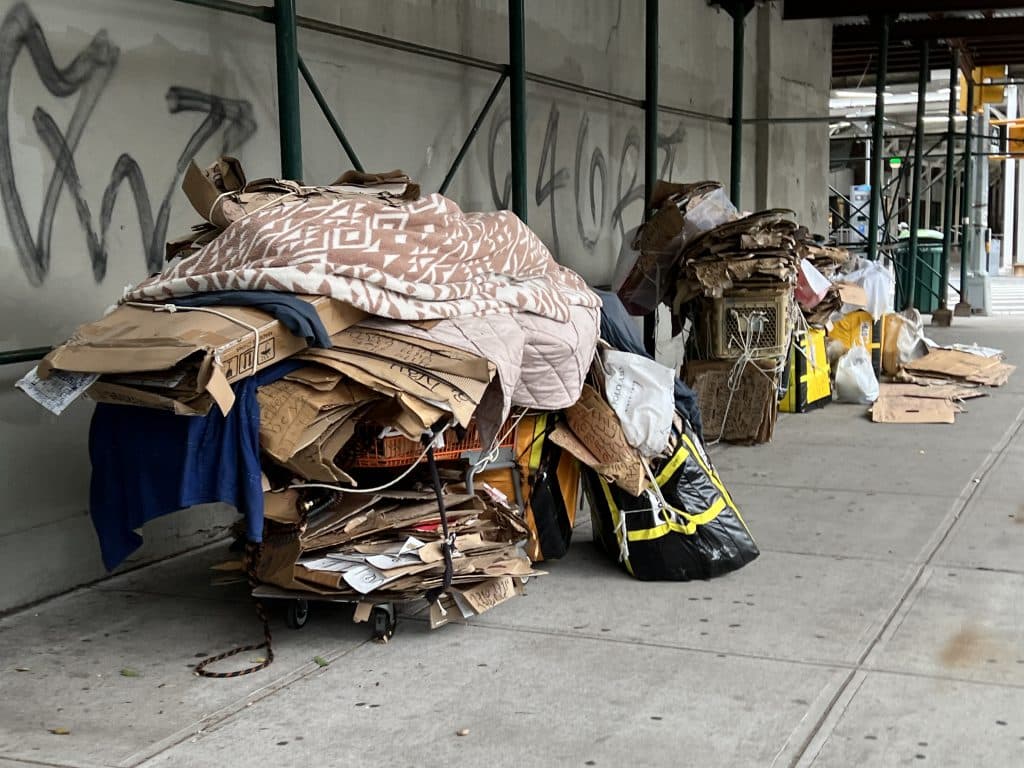 The homeless man moved shopping carts and bags filled with cardboard to the area earlier this month | Upper East Site