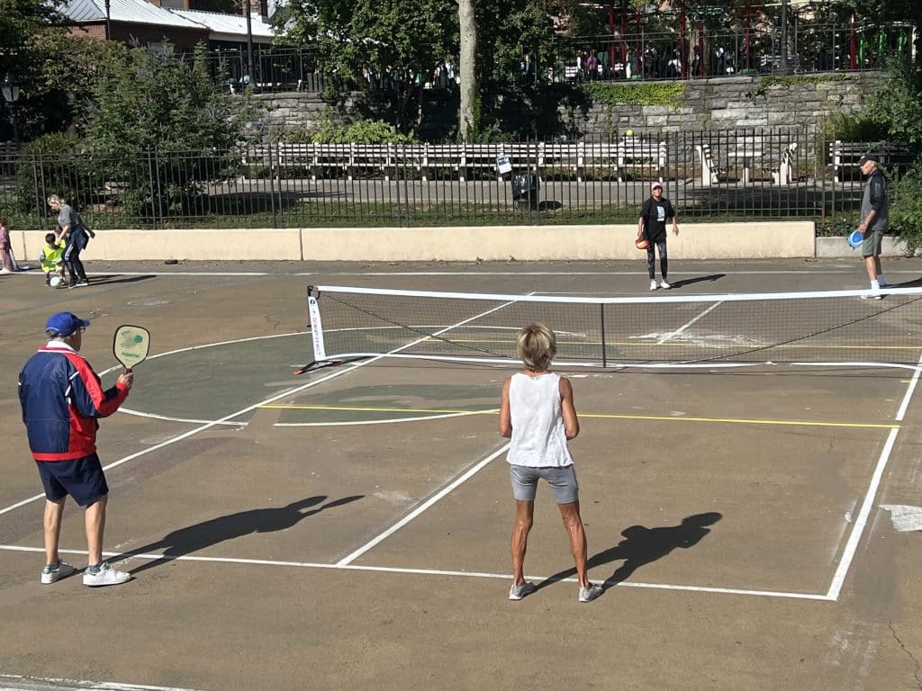Pickleball nets are set up every morning for people to play from 9:30 am to 8:00 pm | Upper East Site