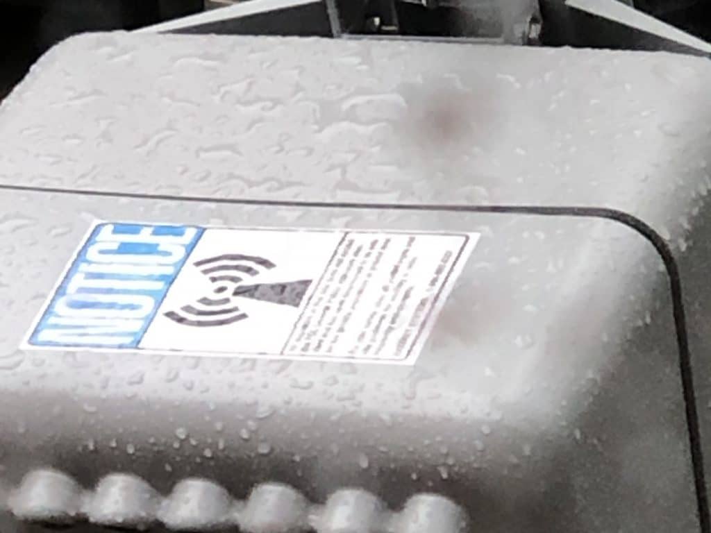 A sticker on the 5G equipment warned about radio frequency radiation 