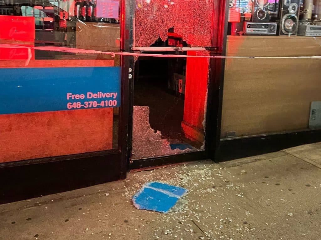 The burglar smashed Vinyl Wine's glass front door to get inside