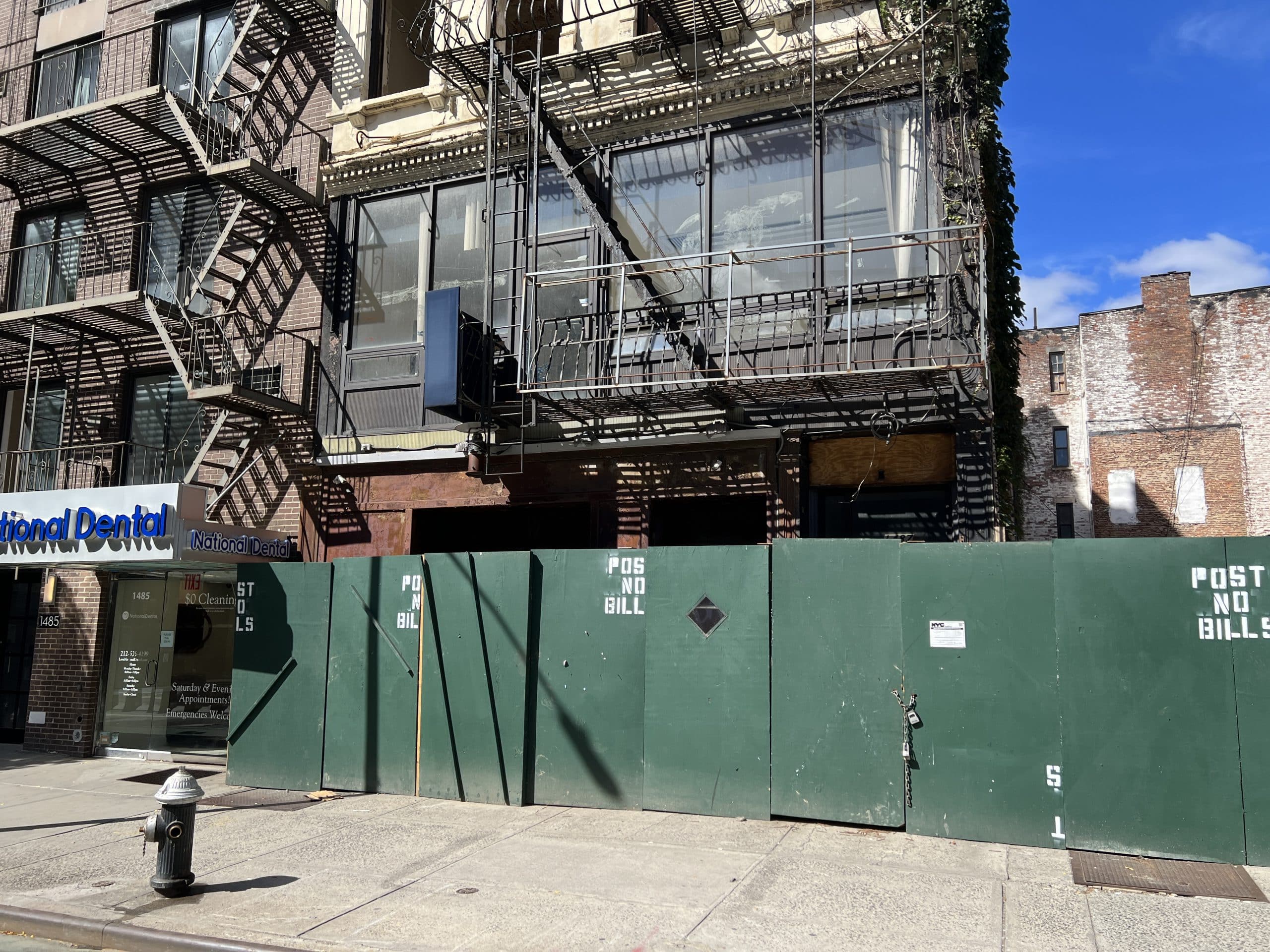 The building at 1487 First Avenue is vacant, fenced into a construction site | Upper East Site