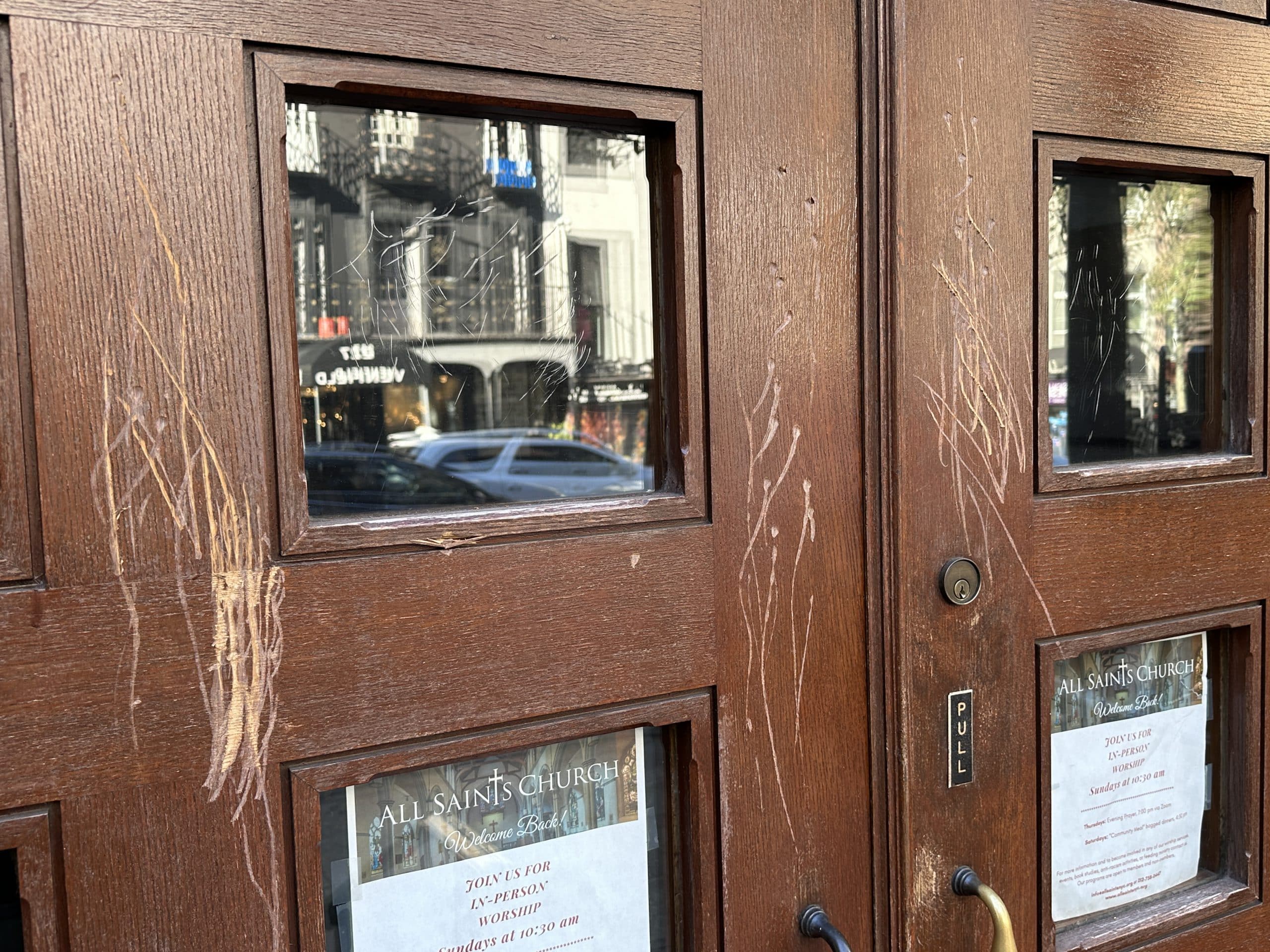 Deep scratches could be seen on the doors to All Saint's Episcopal Church | Upper East Site