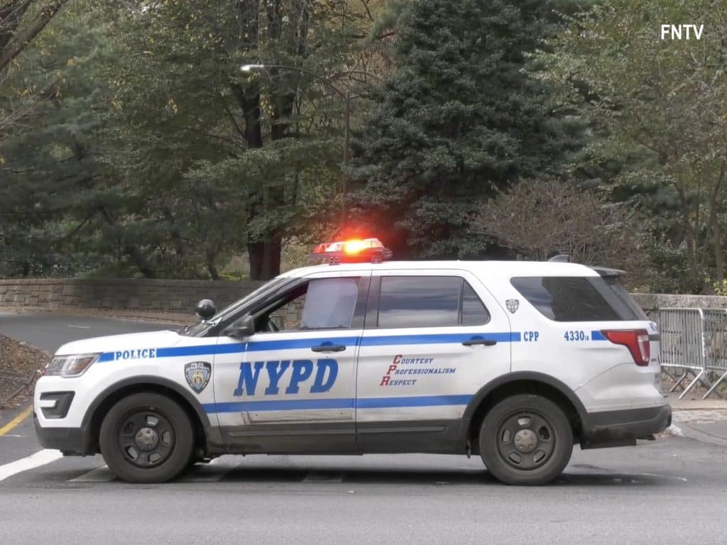 NYPD cruisers blocks access to 65th Street Transverse as FDNY removes struck truck 