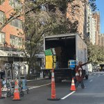Double Parked Amazon truck sits next to unused open parking spaces on Third Avenue | Upper East Site