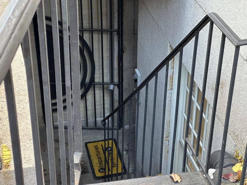 A locksmith was seen repairing the entrance to the garden level of De Niro's home | Upper East Site