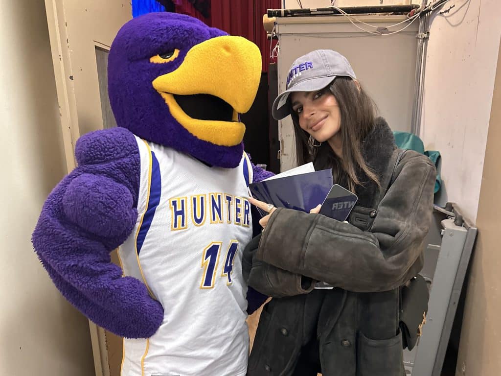 Super model Emily Ratajkowski poses with mascot Hunter Hawk | Hunter College