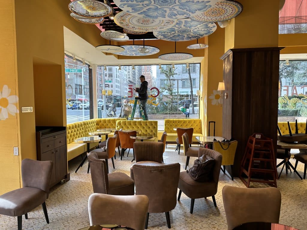 Cafe Serafina features a small seating area that feels larger thanks to the high ceilings | Upper East Site