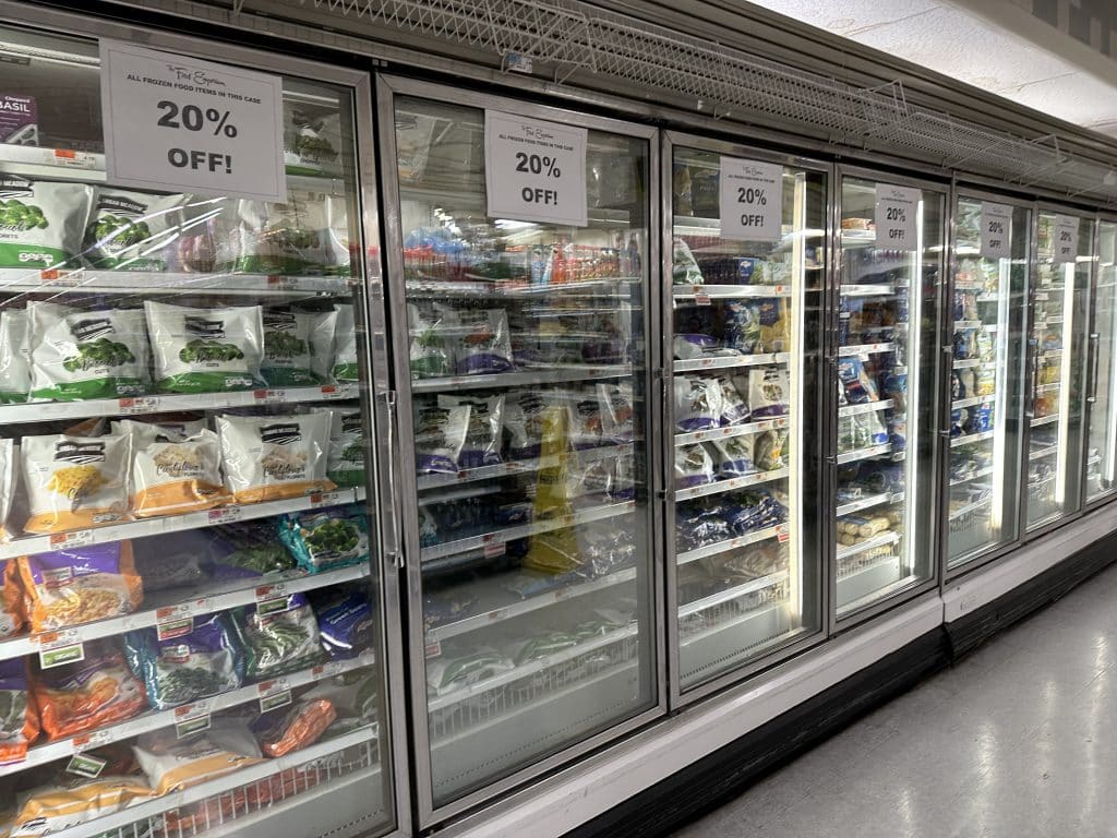 Fliers advertise 20% off frozen foods ahead of the supermarket's closure | Upper East Site