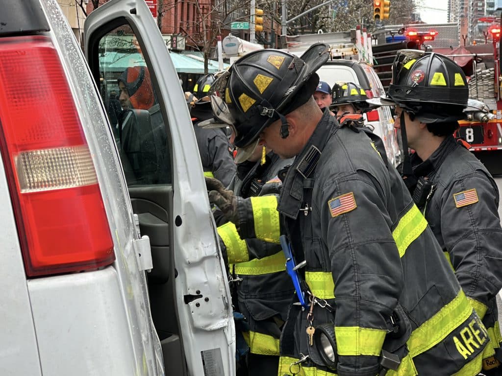 Firefighters had difficulty closing the van's mangled door | Upper East Site