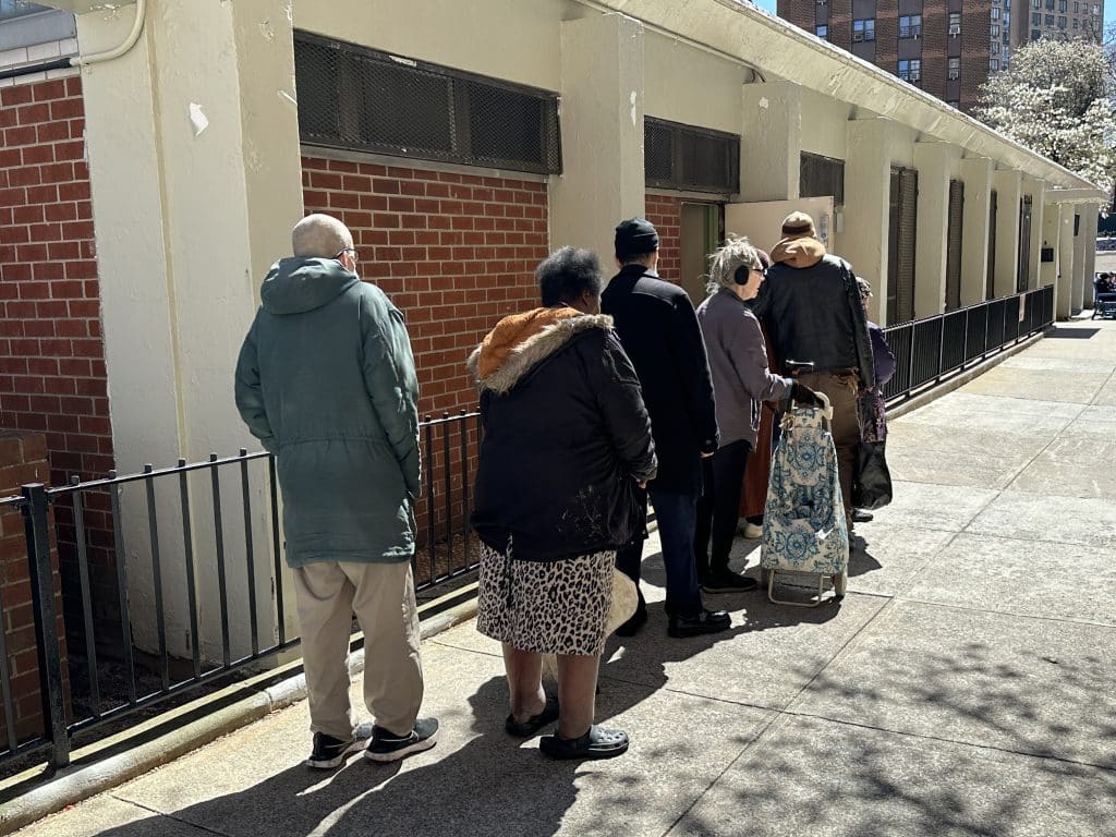 The long line stretched through the Stanley M. Isaacs Center and out a back door | Upper East Site