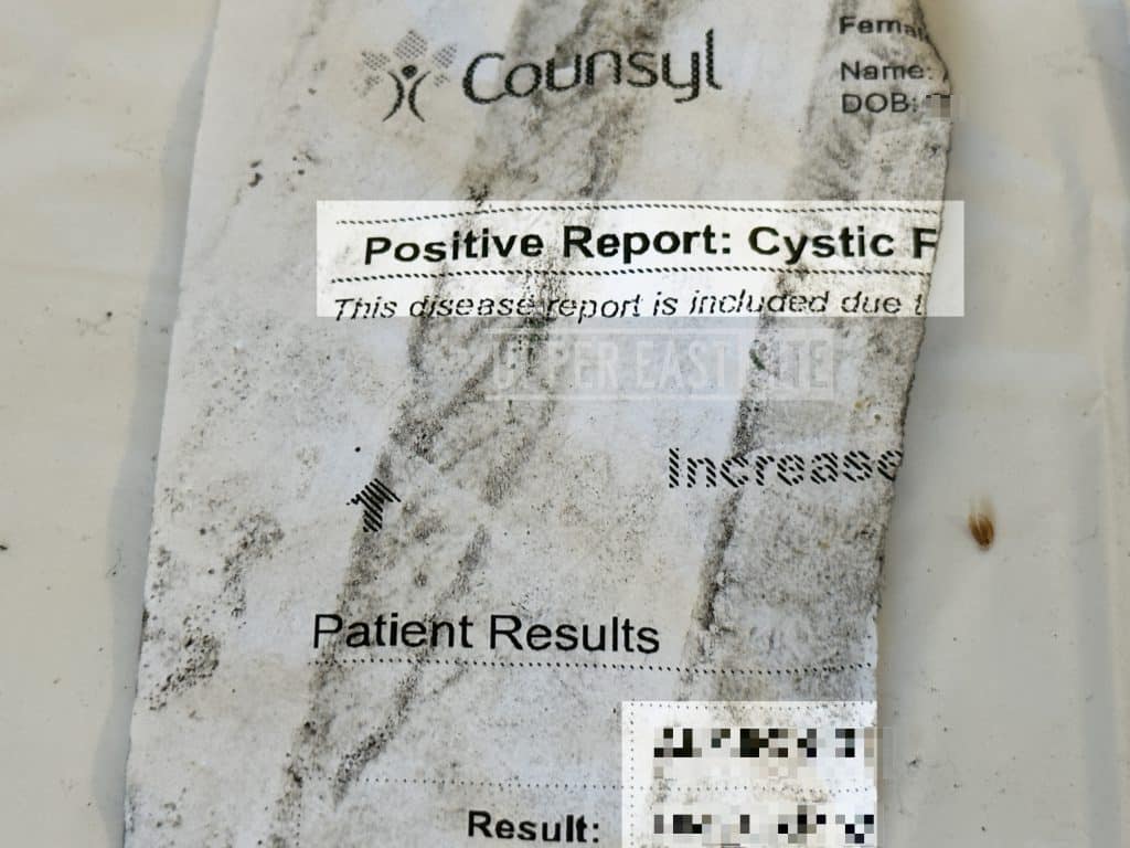 A positive genetic test report for Cystic Fibrosis featured a patients name (blurred and highlighted) | Upper East Site