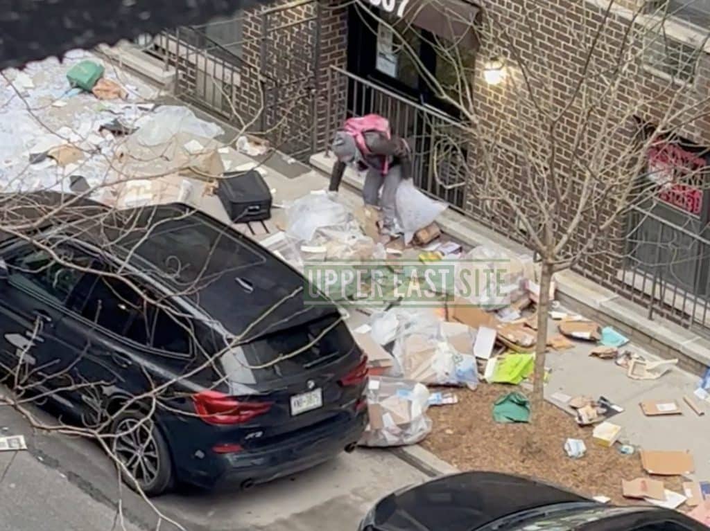 Deranged homeless woman seen ripping open trash bags, celebrating cars running over broken glass | Upper East Site