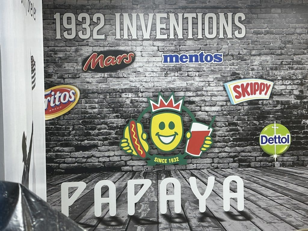 A mural inside the new Papaya King showcases inventions from 1932 | Upper East Site