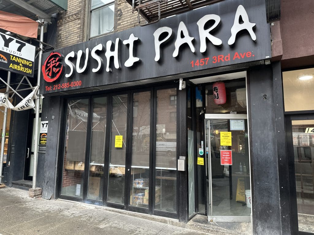 Two Health Department closure orders were stuck on Sushi Para's storefront following its third closure | Upper East Site